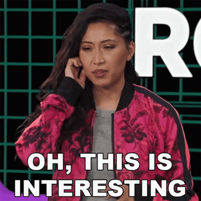 Pink Jacket Woman On Phone Saying Oh This Is Interesting GIF