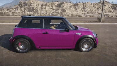 Pink Mini Cooper Driving Down Road GIF