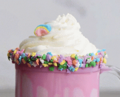 Pink Mug With Whipped Cream And Sprinkles GIF