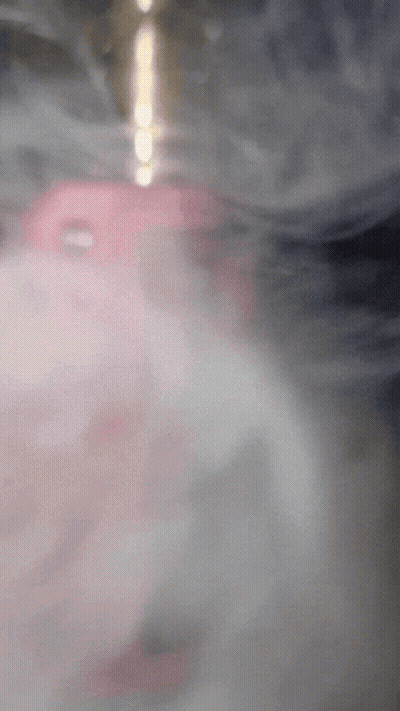 Pink Object Emitting Smoke GIF