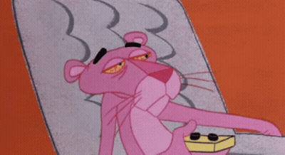 Pink Panther Lying On Bed GIF
