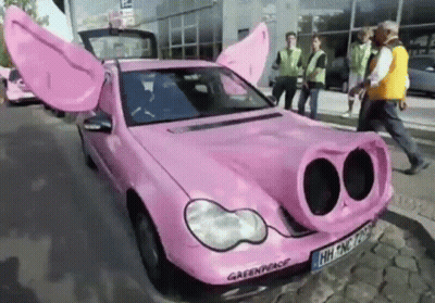 Pink Pig Car With Greenpeace Logo GIF