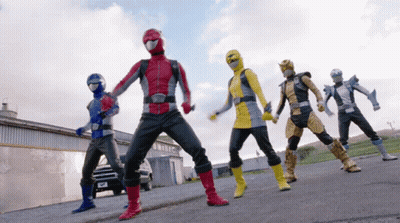 Pink Power Rangers Fighting On Black Background GIF