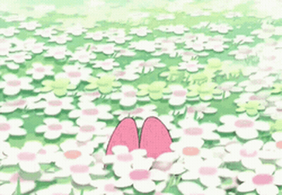 Pink Rabbit With Flower On Head In Field Of Flowers GIF