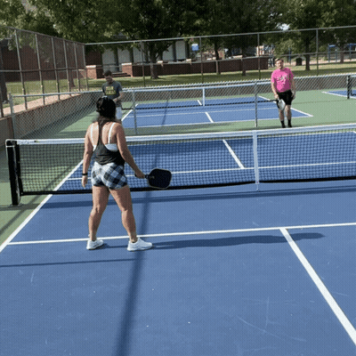 Pink Shirt Man Plaid Tank Woman Playing Tennis GIF