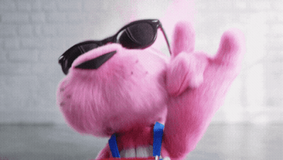 Pink Stuffed Animal In Sunglasses Giving OK Sign GIF