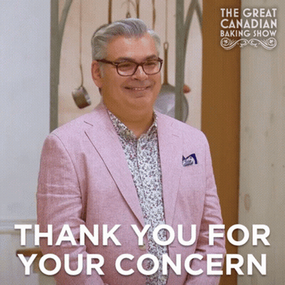 Pink Suit Man Smiling At Great Canadian Baking Show GIF
