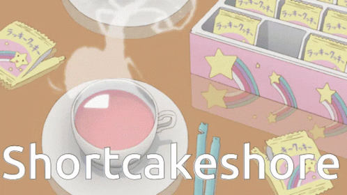 Pink Tea Cup Next To Shortcakes GIF