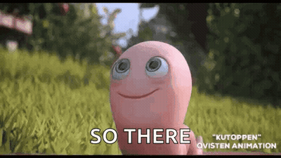 Pink Worm With Big Eyes In Grass GIF