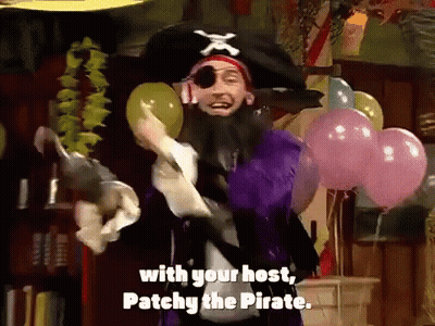 Pirate Holding Balloons Says With Your Host Patchy The Pirate GIF