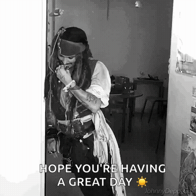 Pirate In Costume Standing In Doorway Saying Hope You're Having A Great Day GIF
