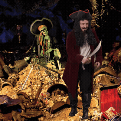 Pirate Man Standing In Front Of Gold GIF