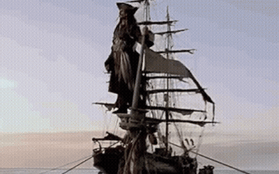 Pirate Ship With Captain Jack Sparrow Statue On Mast GIF