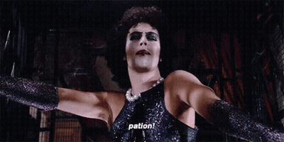 Pirate Standing In Front Of Crowd With Torches GIF