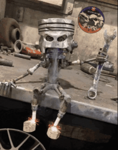 Piston Robot Next To Suzuki Sticker GIF