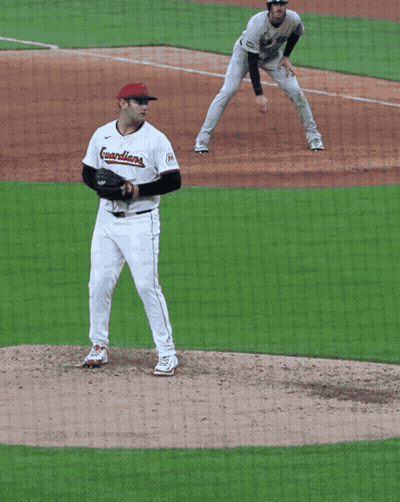 Pitcher Number 7 About To Throw Ball GIF