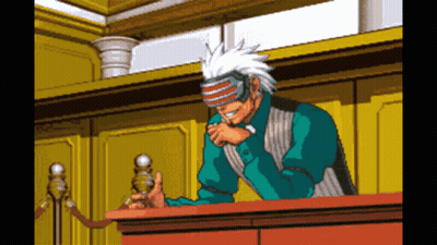 Pixel Art Man Wearing Mask Sitting At Table GIF
