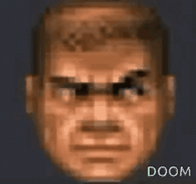 Pixelated Doom Man Face GIF