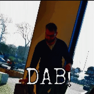 Pixelated Man Carrying Suitcase With Word Dabi GIF