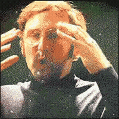 Pixelated Man In Glasses And Suit GIF