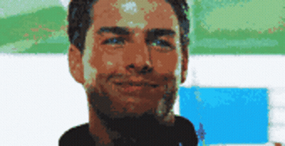Pixelated Man With Beard And Blue Eyes GIF