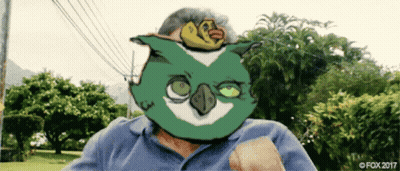 Pixelated Man With Bird Mask GIF