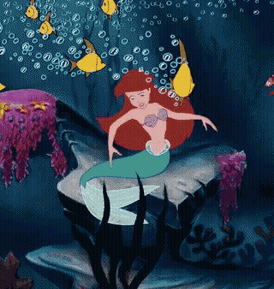 Pixelated Mermaid Holding Baby GIF