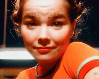 Pixelated Woman Face Surrounded By Trees GIF