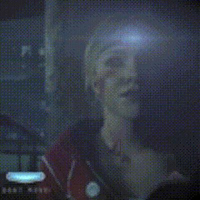 Pixelated Woman Face With Blue Light GIF