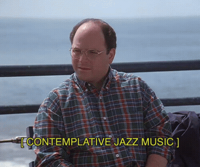 Plaid Shirt Man Contemplative Jazz Music on Railing