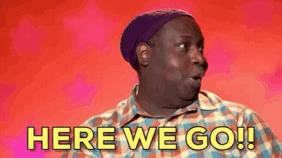 Plaid-Shirt Man Purple Hat Saying Here We Go GIF