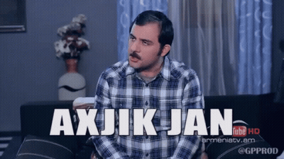 Plaid Shirt Man Sitting On Couch Saying Axjikjan GIF
