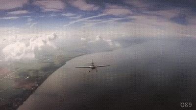 Plane Flying Over Water Number 089 GIF