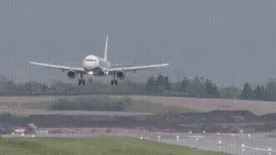 Plane Taking Off From Runway GIF