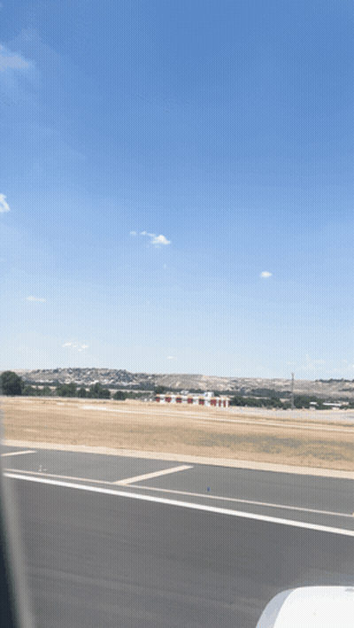 Plane Taking Off With Blue Sky GIF