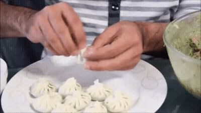 Plate Of Dumplings On Checkered Plate With TikTok GIF