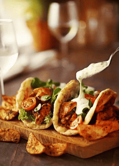 Plate Of Food With Sauce Poured On Top GIF