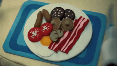 Plate Of Food With Tomatoes Bacon And Mushrooms GIF