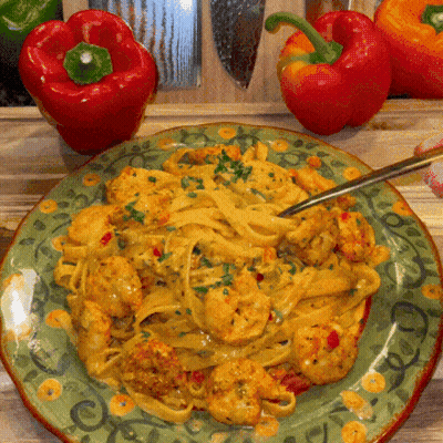 Plate Of Noodles And Shrimp With Fork GIF