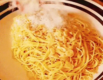 Plate Of Noodles With Garlic GIF