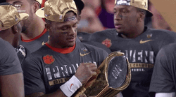 Player Rubbing A Trophy GIF