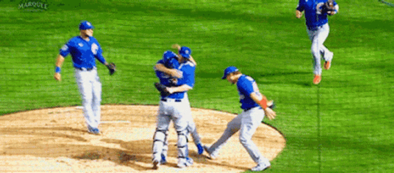 Players Hugging Each Other After Cubs Win GIF
