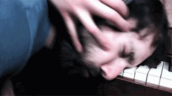 Playing Piano With Face GIF
