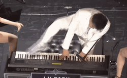 Playing Piano With Foot GIF