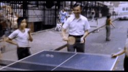 Playing Ping Pong On The Street GIF