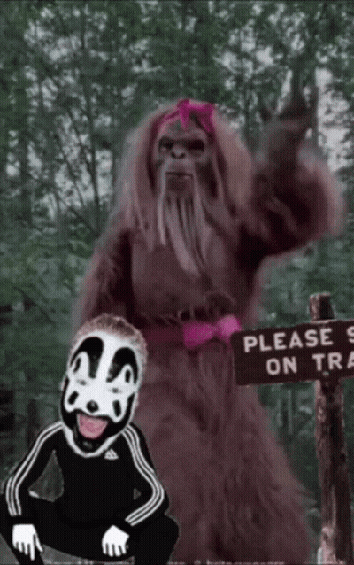 Please Stay On Trail Sign Next To Bigfoot GIF