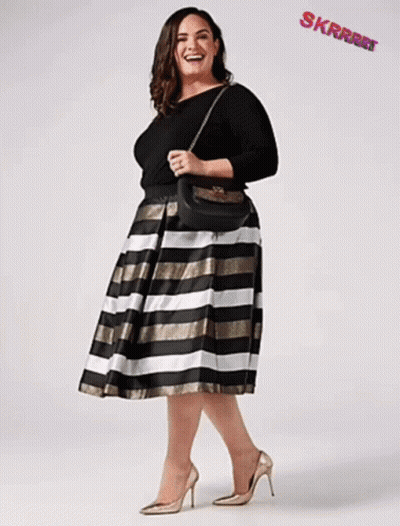 Plus Size Woman In Black Top And Striped Skirt GIF