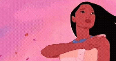 Pocahontas Standing With Leaves Flying GIF