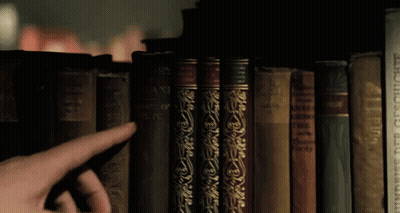 Pointing Finger at Book Hundertjahrgeschichte