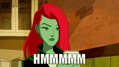 Poison Ivy Holding Cell Phone Hmmmm GIF